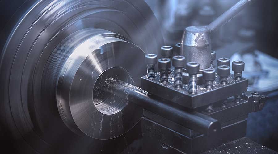 What are the advantages of manual turning compared to CNC turning